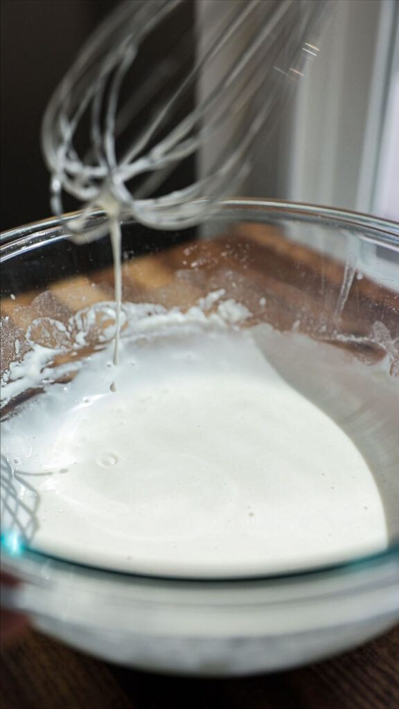 whisking together tempura batter